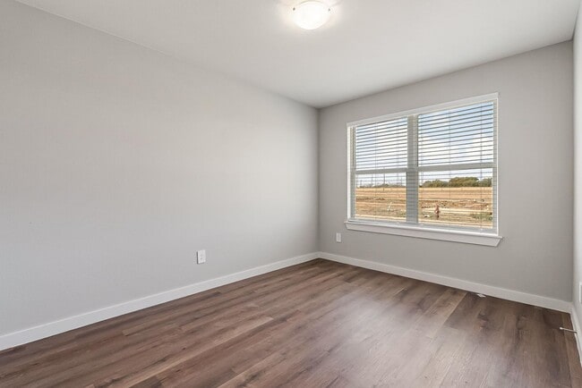 Building Photo - Available May 1: Stylish & Spacious Home Perfect for Families