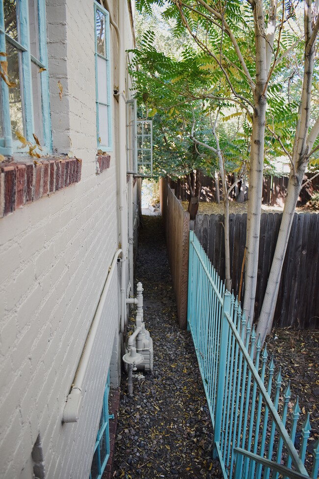 Alley to Garage & Garbage Cans - 485 S Logan St