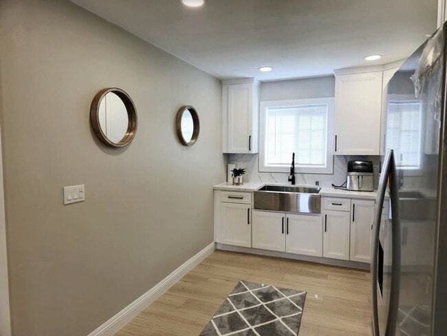 Building Photo - 8354-56 Adams St