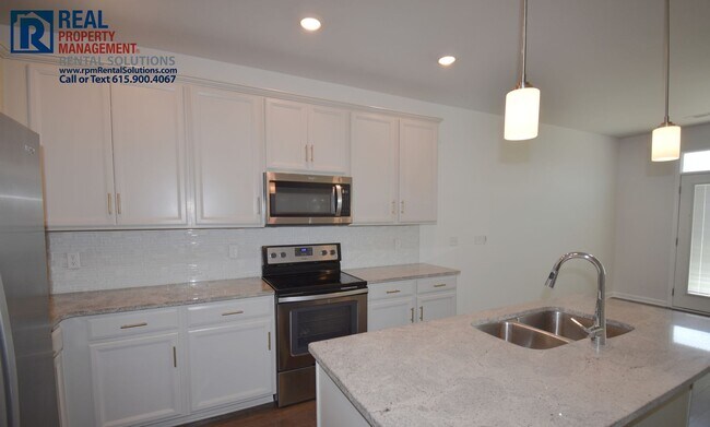 Building Photo - Amazing 3BR/2.5BA townhome w/ garage, washer/dryer included, triple Rockvale schools!