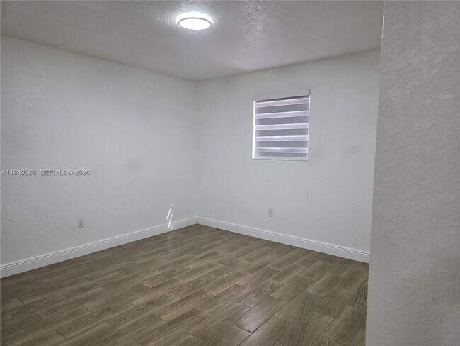 Building Photo - 1191 W 53rd Terrace