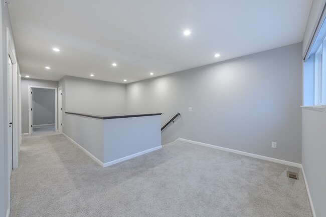 Building Photo - Awesome maple grove 5 bed 4 bath townhome! Pond views, 2 years old!