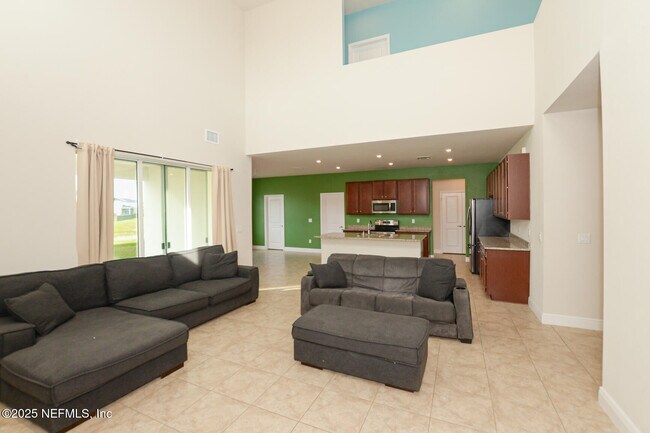 Building Photo - 10976 SW Tessili Wy