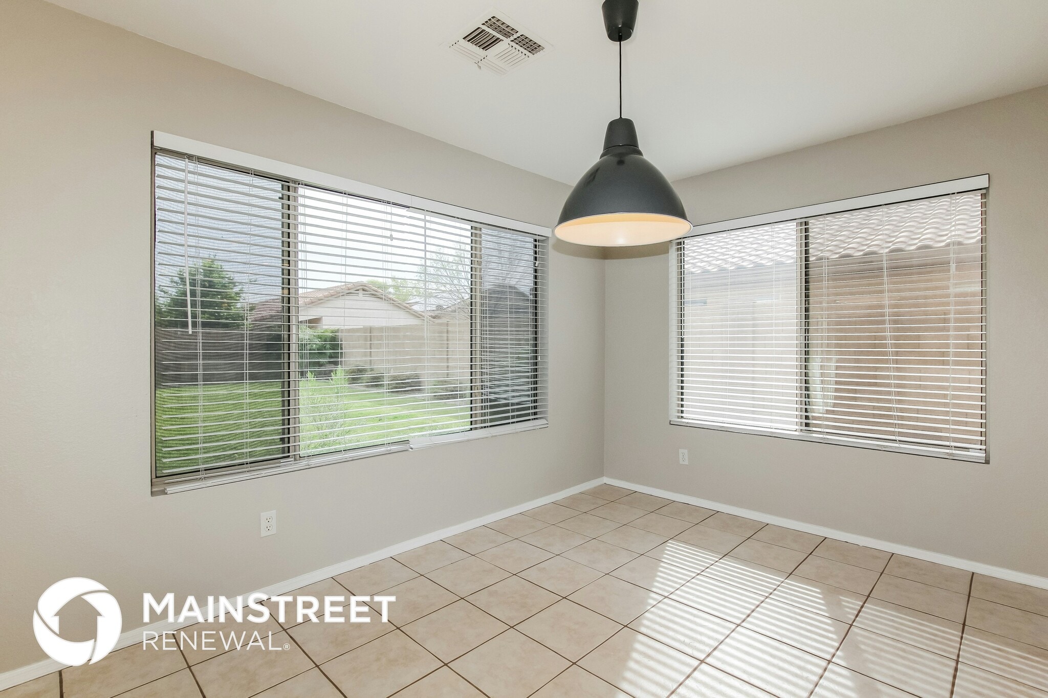 Building Photo - 7013 W Aire Libre Ave