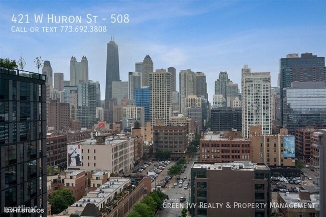 Building Photo - Stunning River North condo with Huge Patio!