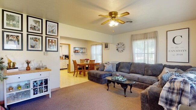 Building Photo - Home w/Yard & Garage