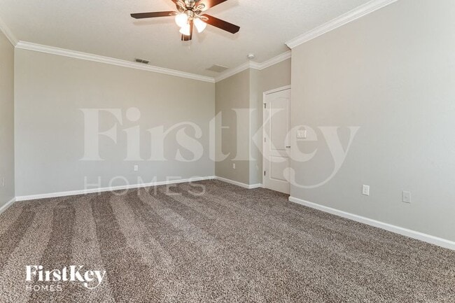 Building Photo - 8906 Devon Pines Dr