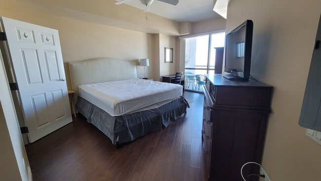 Building Photo - ***GORGEOUS FURNISHED 1 BEDROOM CONDO AT A...