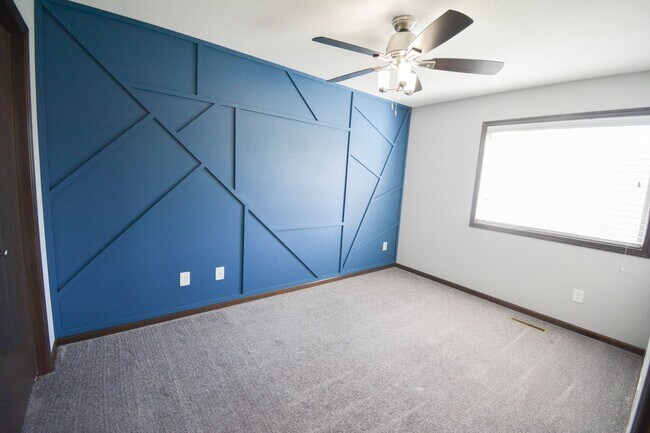 Building Photo - Remodeled 4-Bedroom Home for Rent with Garage & Deck