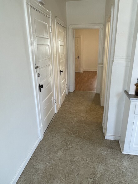 First door is to the basement/laundry access. Second door is a large closet/pantry. - 5313 Magnolia Ave