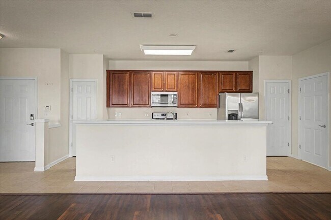 Building Photo - Peaceful Pond Views + Open Layout | 2BR + Office in Prime Location