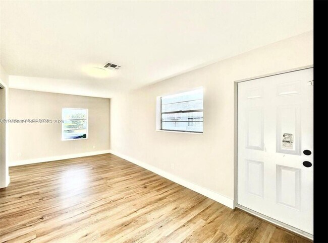 Building Photo - 6729 Petunia Dr