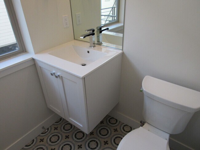 Building Photo - Town home a Block away from Sloan's Lake with roof top Deck