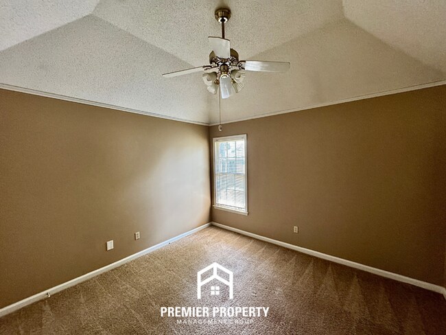 Building Photo - Spacious 3BR/2BA Near Southwind | 1,958 Sq Ft, Brick Fireplace, 2-Car Garage & Quiet Cove