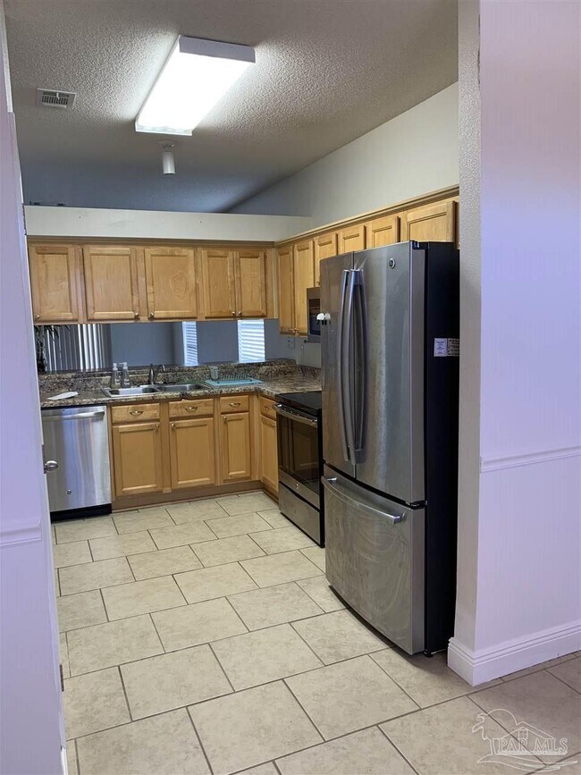 Building Photo - 8949 Camelot Pl