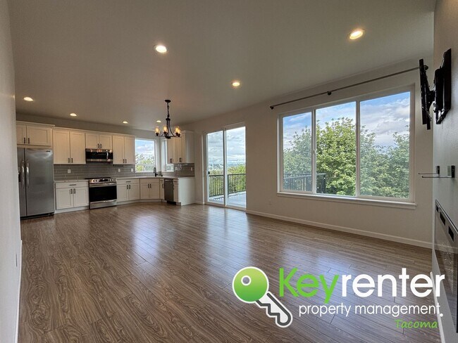 Building Photo - Stylish 4-Bedroom Home with Finished Basem...