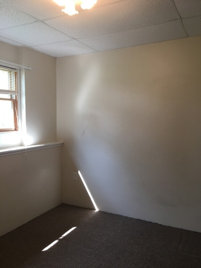 Building Photo - Beautiful secluded 4 bedroom 2.5 bath home with 2 stall detached garage and descent sized yard