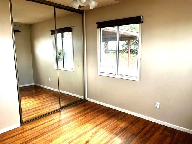 Building Photo - 2BR 1BA Allied Gardens Home - Hardwood Floors, Washer/Dryer, 2 Car Garage, HUGE backyard, 2 Pets ...