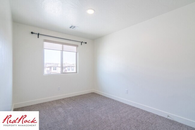 Building Photo - Stand Alone 4 Bedroom Corner Unit.