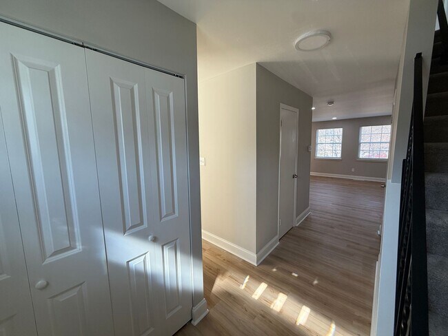 Building Photo - New Everything 4BR Townhome with Private Lower Level Suite | Stainless Kitchen | LVP + New Carpet...
