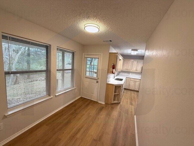 Building Photo - AVAILABLE NOW!!! Custom 3-Bed 2-Bath w/ 2 Dining Areas & View of Creek