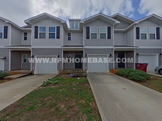 Primary Photo - Modern 3-Bedroom Townhome with Stylish Upd...