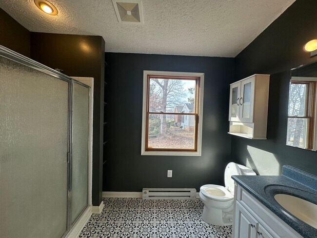 Building Photo - House in Bedford with Lot of Outdoor Space.