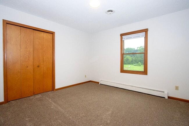 Building Photo - Three Bedroom Duplex