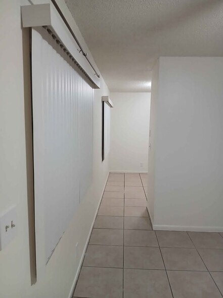 Hall to Kitchen - 9021 W Highland Pines Dr