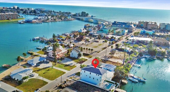Building Photo - Waterfront Johns Pass Luxury | Steps to Beach + Pool, Hot Tub & Dock