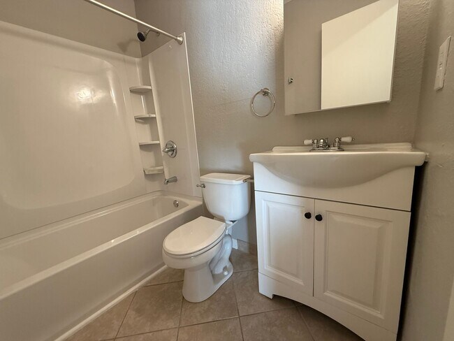Building Photo - Move-in Special: Enjoy your first month of...