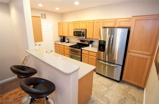 Building Photo - 8777 W Maule Ave