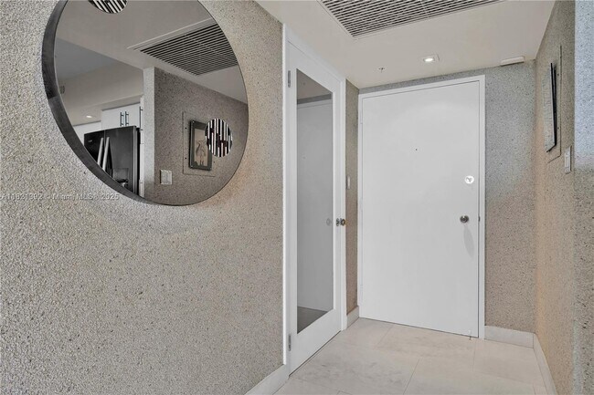 Building Photo - 5600 Collins Ave