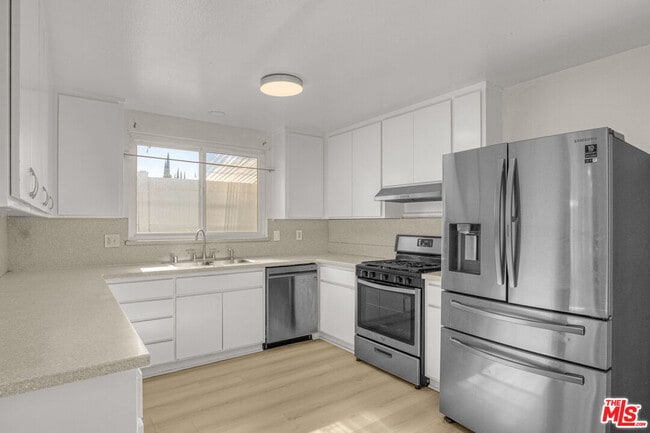 Building Photo - 7701 Baird Ave