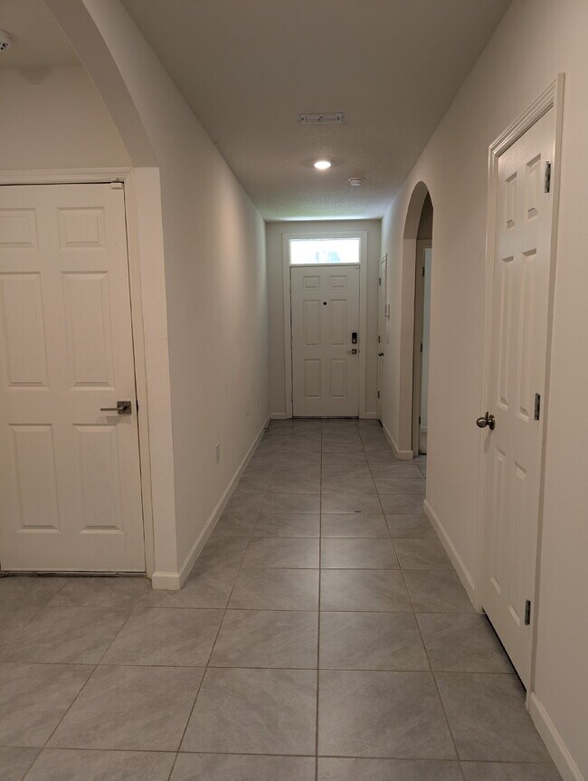 Building Photo - Modern 4-Bedroom Home with Large Backyard in Quiet SW Palm Bay