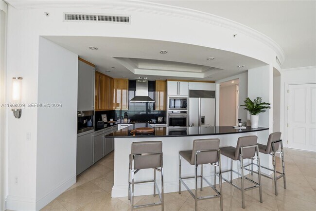 Building Photo - 10295 Collins Ave