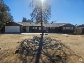 Building Photo - 3 BEDROOM, 2 BATHROOM HOME IN VICTORVILLE....