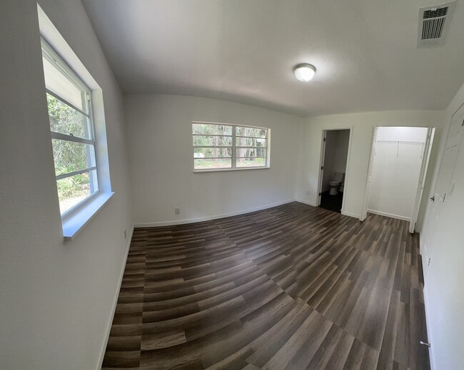 master bedroom with closet and bathroom - 112 Big Apple Rd