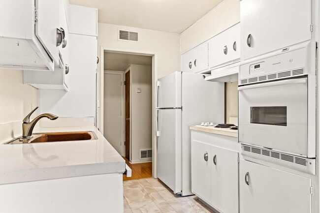 Building Photo - Utilities & Parking Included! Massive 2BD w/ Community Amenities