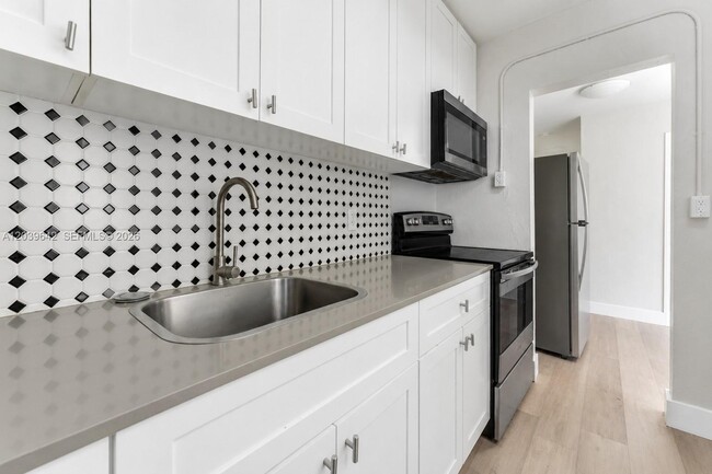 Building Photo - 6647 SW 59th Pl