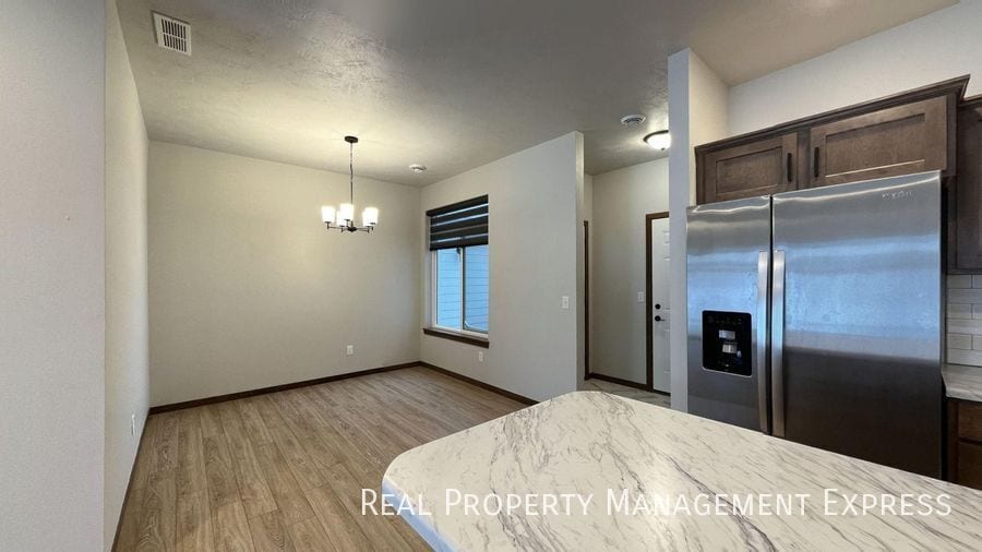 Building Photo - Modern Luxury: 3BR Townhome with Stylish F...