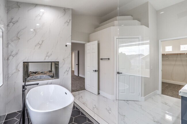 Building Photo - Luxury 5-Bedroom Home in Guard-Gated Community with 3-Car Garage