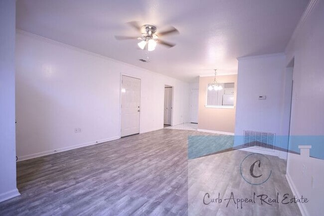 Building Photo - First month move in special $900!! Beautiful 3-bed, 2 bath condo with 2-car garage - includes was...