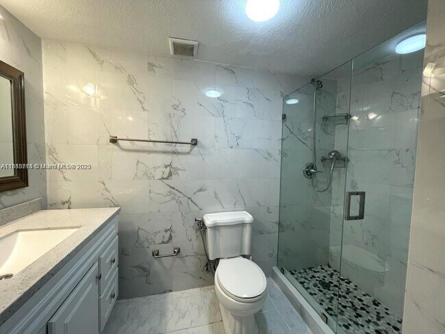 Building Photo - 4275 NW S Tamiami Canal Dr