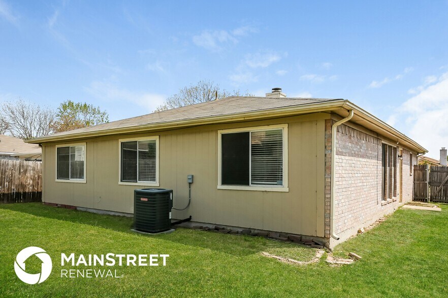 Building Photo - 7128 Wagonwheel Rd