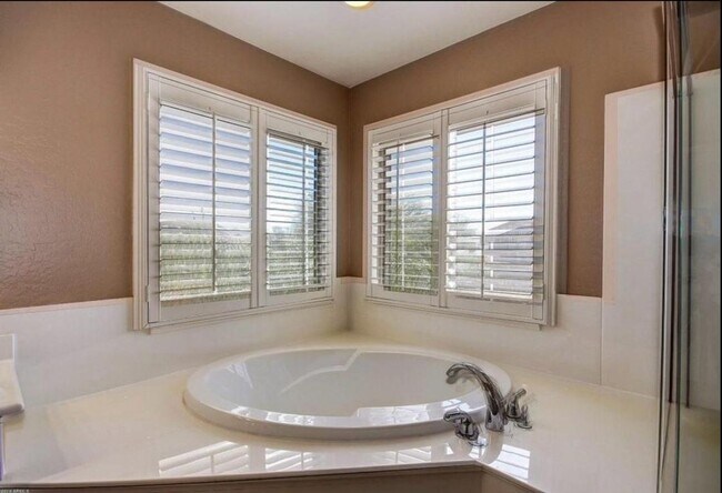 Building Photo - Stunning 4BR House in Phoenix with sparkling pool, resort style backyard and solar panles