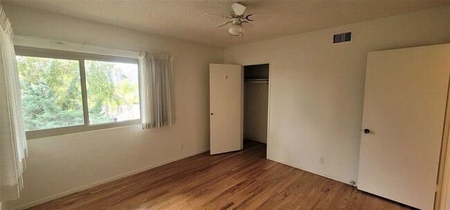 Building Photo - Classic, Midcentury 3 bedroom with Den, 2.5 bath home nestled into hillside with secluded backyar...