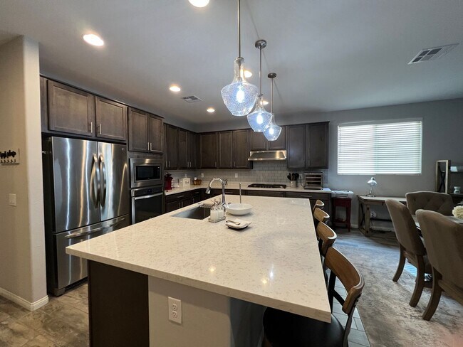 Building Photo - Fully Furnished Designer Home in Guard-Gated Rhodes Ranch – Short-Term Luxury Rental