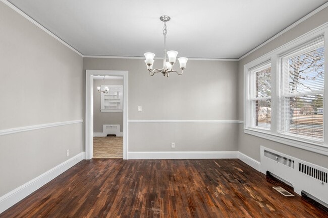 Building Photo - SW, Large Brick Two Bedroom PLUS Two Sun-Rooms, Hardwoods, LR & Separate DR, Fire Place!