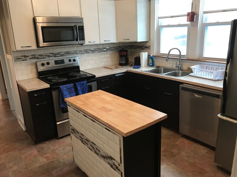 Stainless steel appliances with newer countertops - 36 Harris Ave